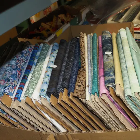 box of fabric pieces