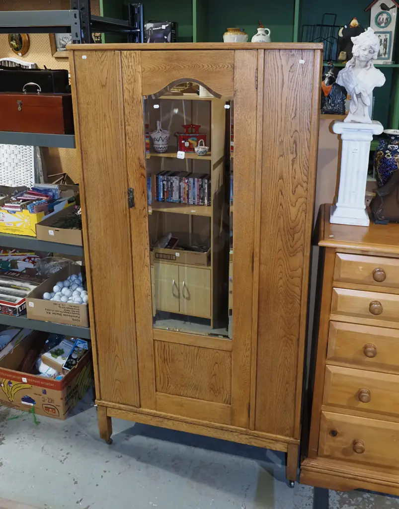 oak single door wardobe on casters with bevelled edge mirror H1870 W945 D510 Image 1++