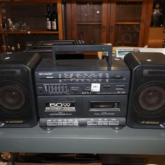 Sharp portable twin cassette and radio player