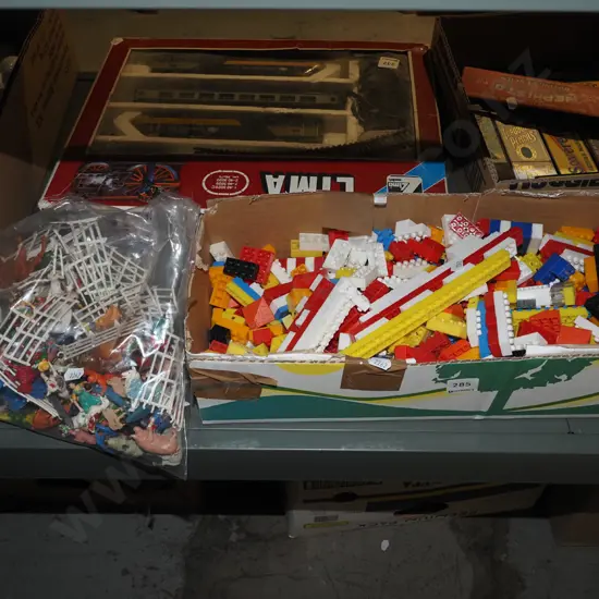 box; plastic toy bricks, plastic farm animals, fences etc