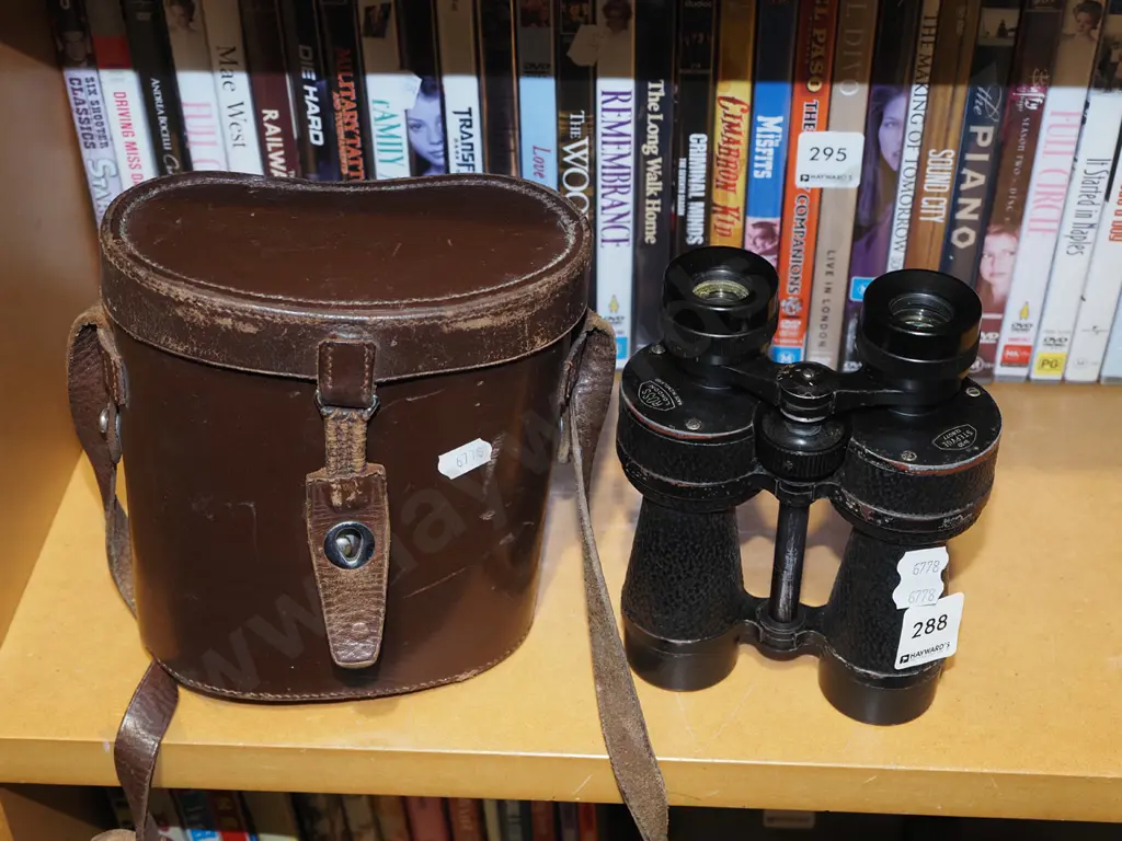 pair of 8x30 leather cased field binoculars Image 1++