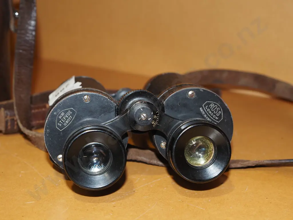 pair of 8x30 leather cased field binoculars Image 1++