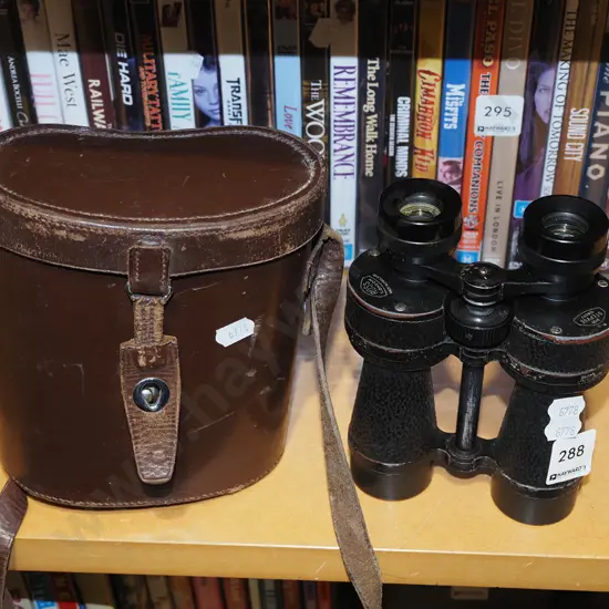 pair of 8x30 leather cased field binoculars