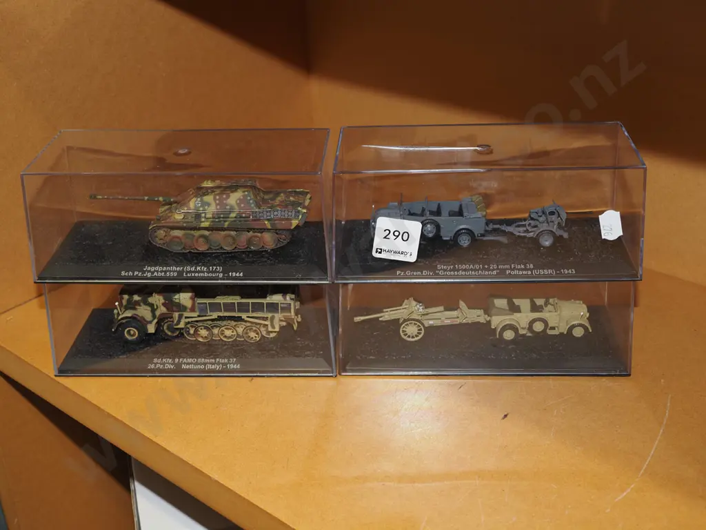 4x military vehicles in plastic cases - 1 has crack to lid Image 1++