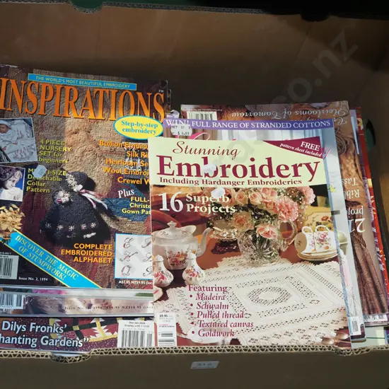 box of embroidery and other crafting magazines