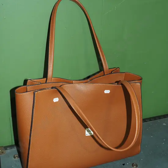 as new large brown hand bag