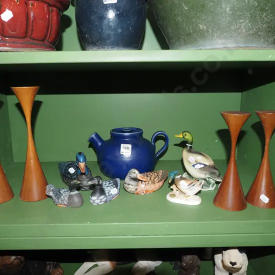 blue ceramic teapot, duck figurines, candlesticks