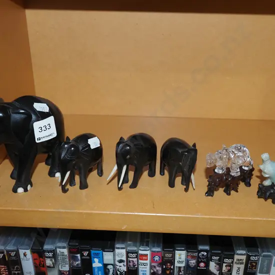 shelf of elephant figurines