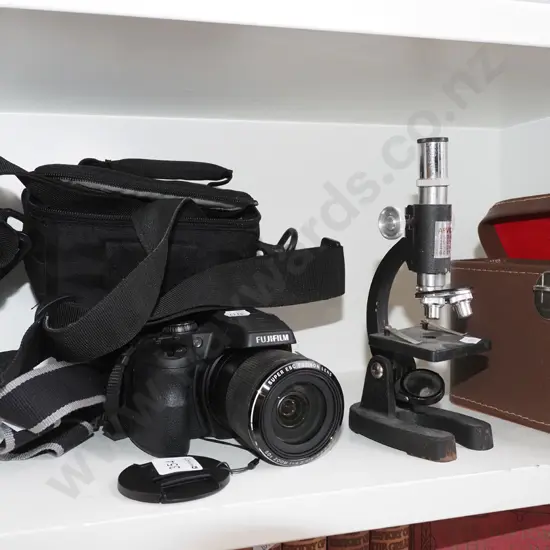 Fujifilm FinePix SL-1000 digital camera and carry case (no charger) and a small microscope in case