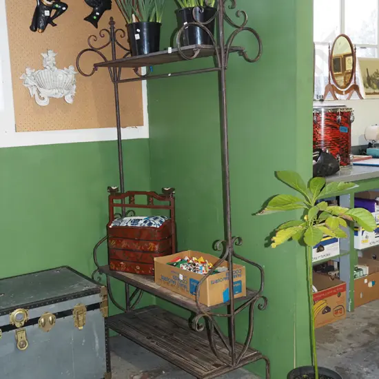 wrought metal clothes rack with hat shelf and shoe storage and rail 