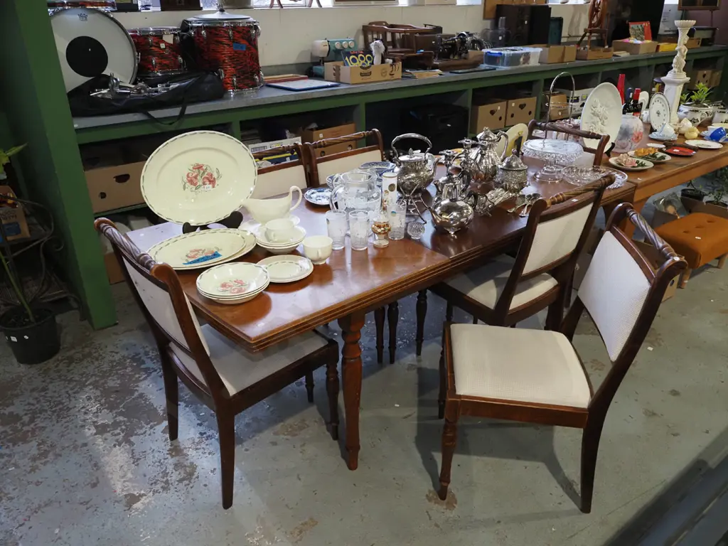 mahogany extending dining table with 6 matching chairs- some fading to table top Image 1++