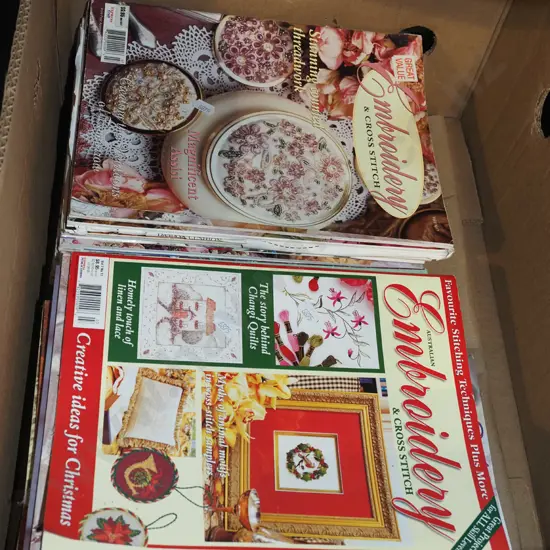 box of embroidery magazines