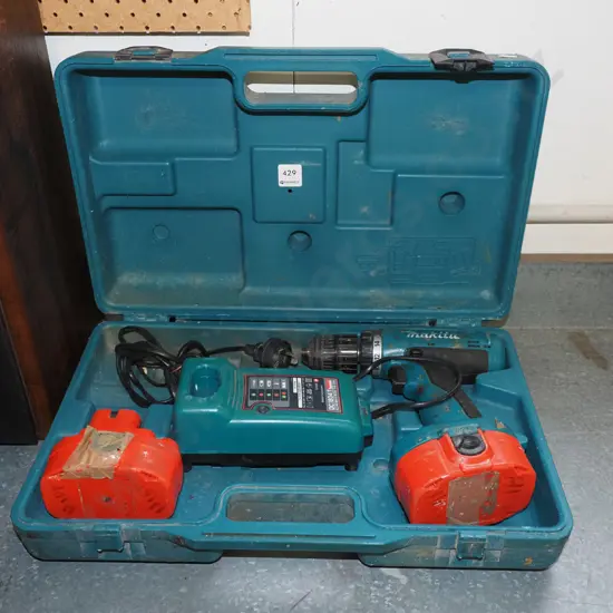 Makita battery powered drill and 2 batteries