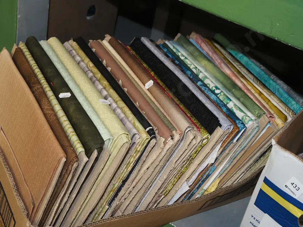 box of fabric pieces Image 1++