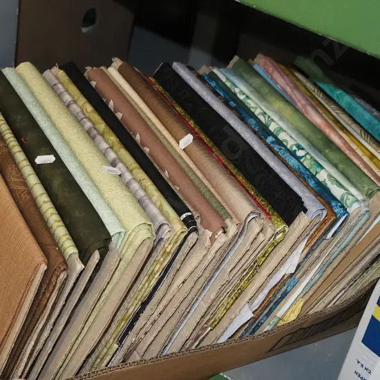 box of fabric pieces