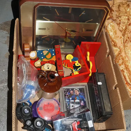 box; wall clock, bookends, binoculars etc