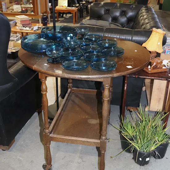 oak drop side tea trolley on casters