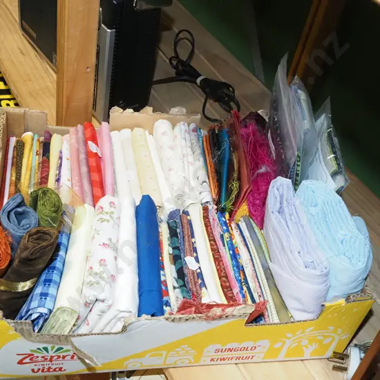 box of fabric pieces