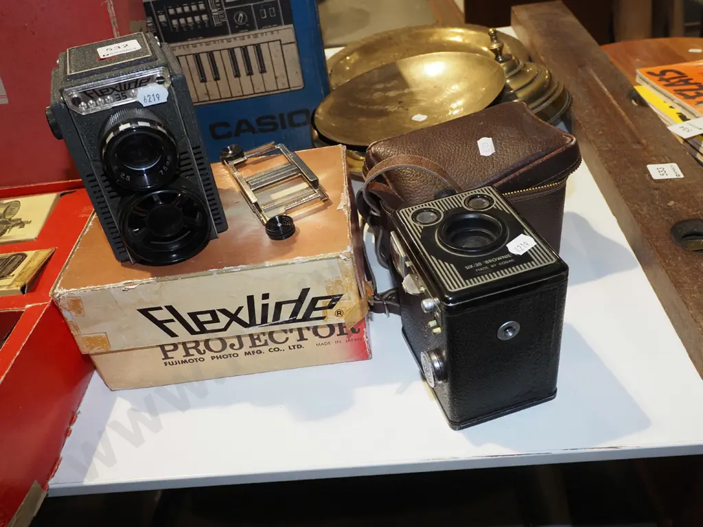 Flexlide 35mm slide projector (cord has been cut) and Kodak Six-20 Brownie box camera Image 1++