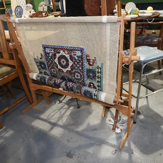 partially finished woollen tapestry on frame