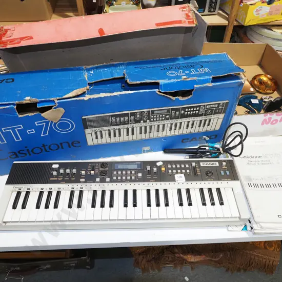 Casio MT-70 keyboard with bar code reader, music sheets and manual - AS IS - NO RETURNS - no power cord, some notes