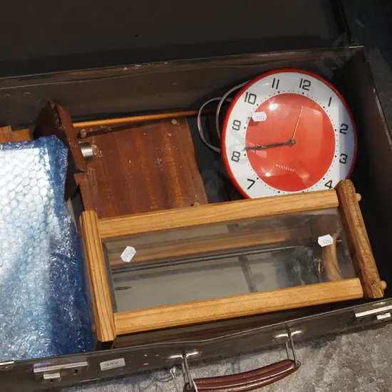 vintage suitcase, wooden candle holders, wall clock etc