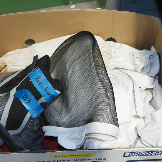 box; beekeepers suit and boots