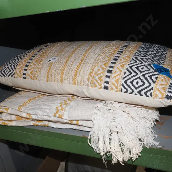 woven throw and matching cushion