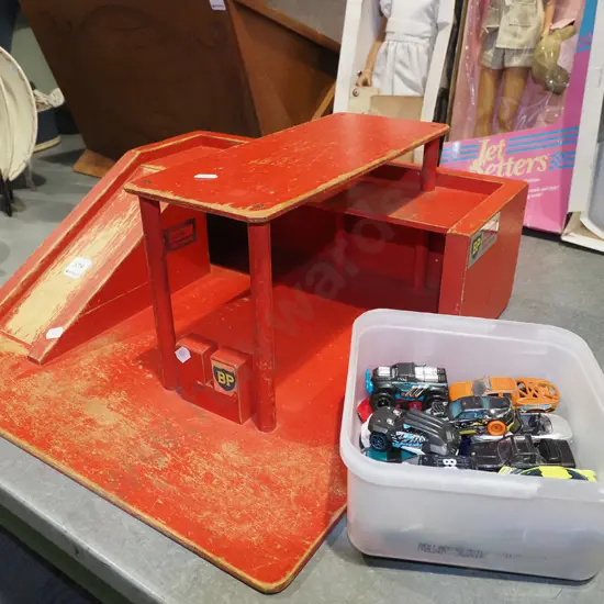 wooden toy garage and vehicles