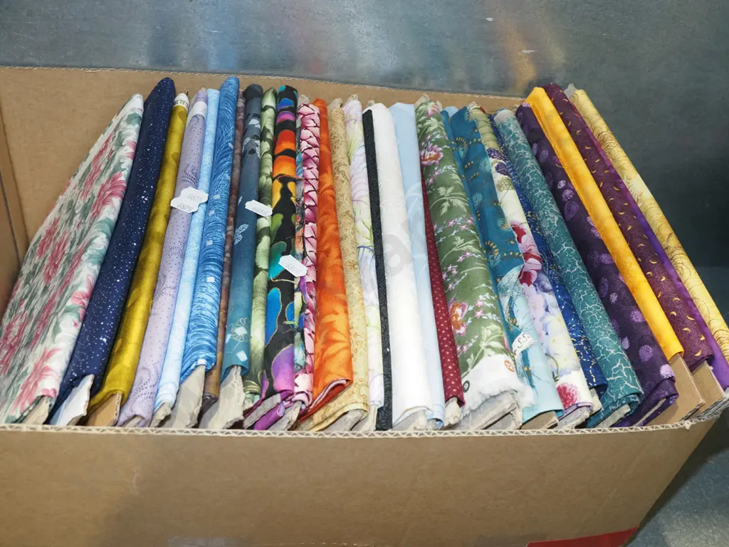 box of fabric pieces Image 1++