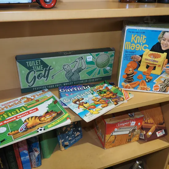 Toilet Time golf set, Garfield books, Knit Magic kit