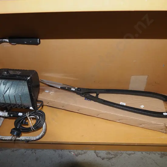 pair of long handled hedge trimmers, halogen work light