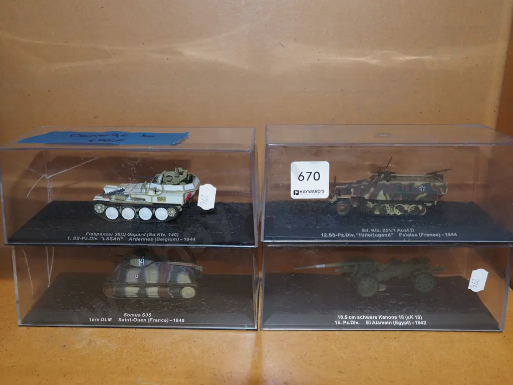 4x miltary vehicles in plastic cases - 2 cases have cracks Image 1++