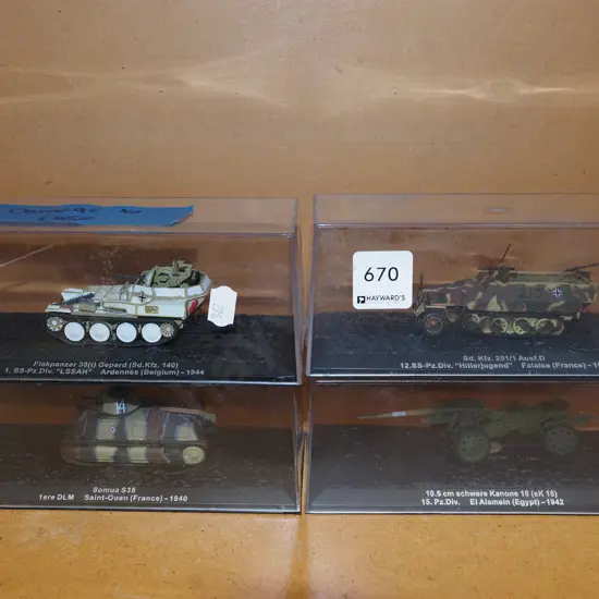 4x miltary vehicles in plastic cases - 2 cases have cracks