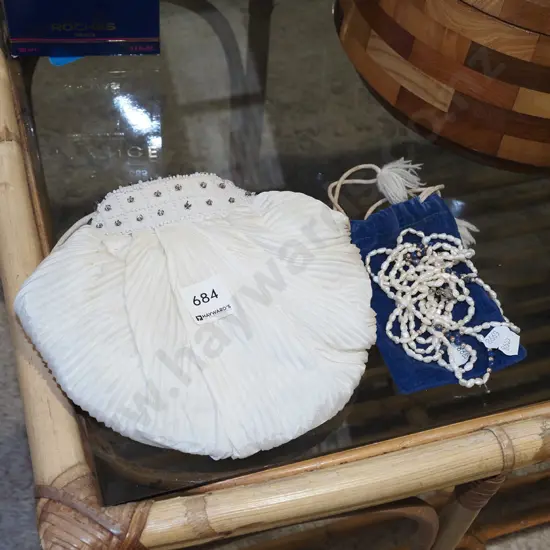 evening purse, beaded necklaces