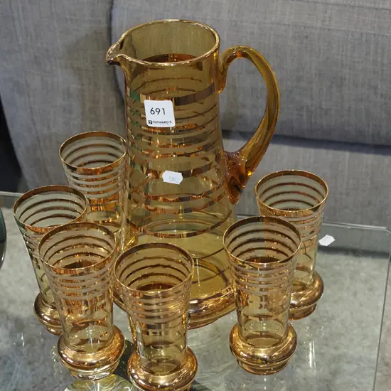 amber glass gold band water jug and 6 glasses