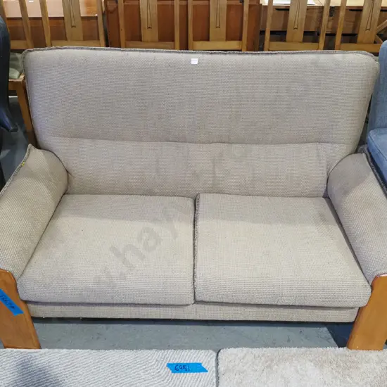 brown upholstered and rimu 2 seater settee