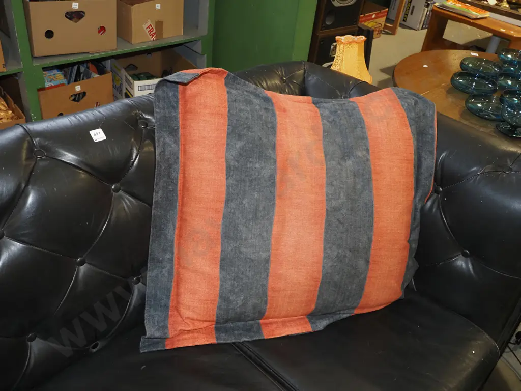 large charcoal and rust orange cushion Image 1++