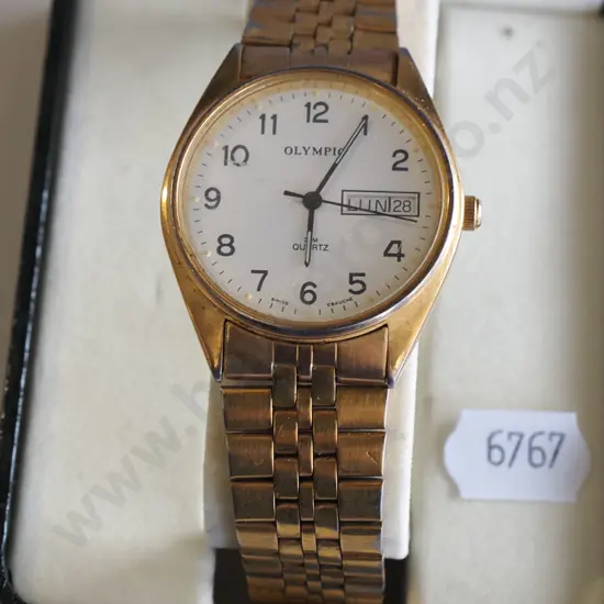 cased Olympic men's wristwatch