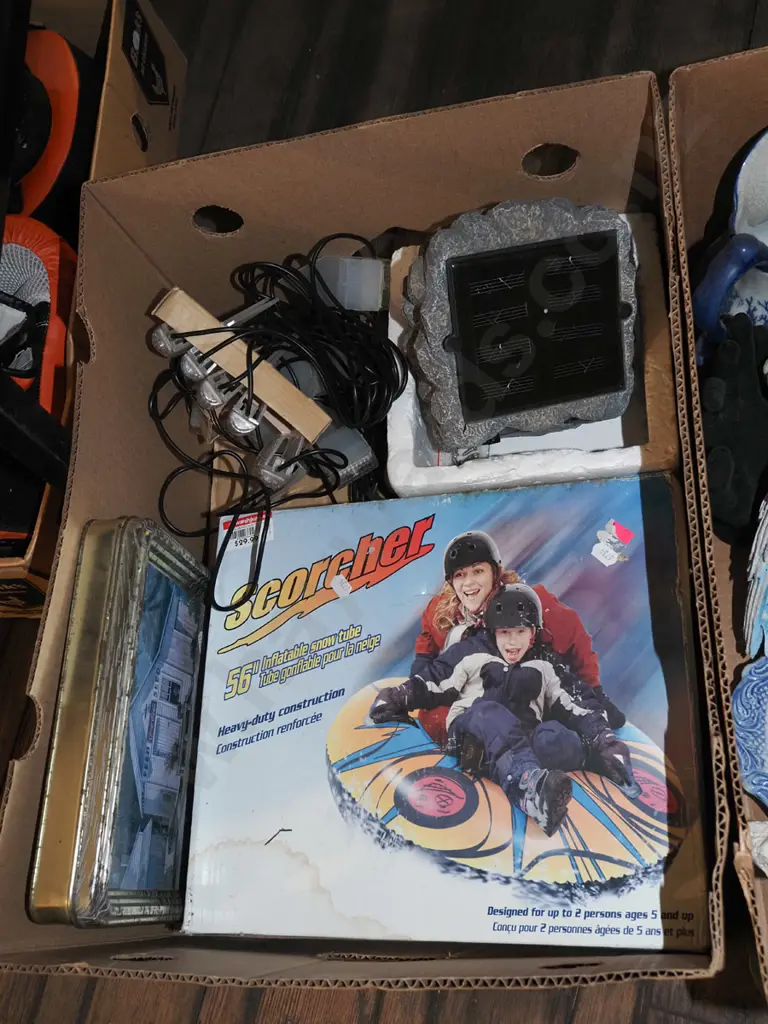 box; tin, inflatable snow tube, solar power lights  Image 1++