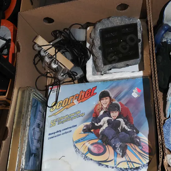 box; tin, inflatable snow tube, solar power lights 