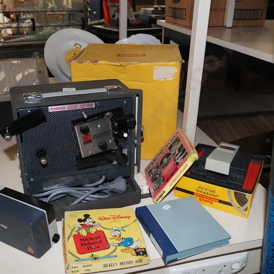 Kodak 8mm film camera, projector, splicer and screen