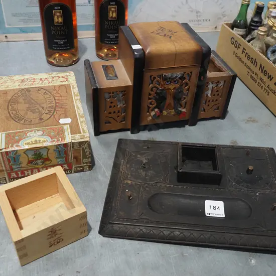 retorer's inkwell set, cigar box, cigarette container