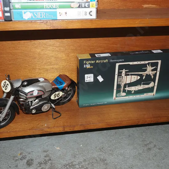 boxed yet to be assembled model of aircraft and motorcycle