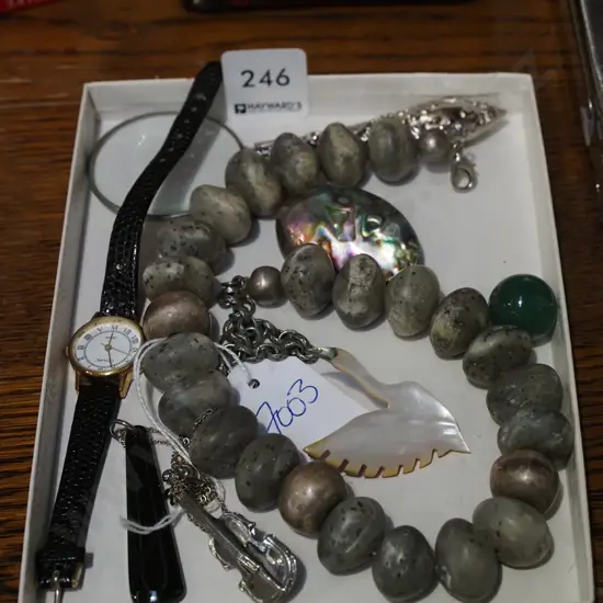 tray; magnifying glass, beaded necklace, watch etc