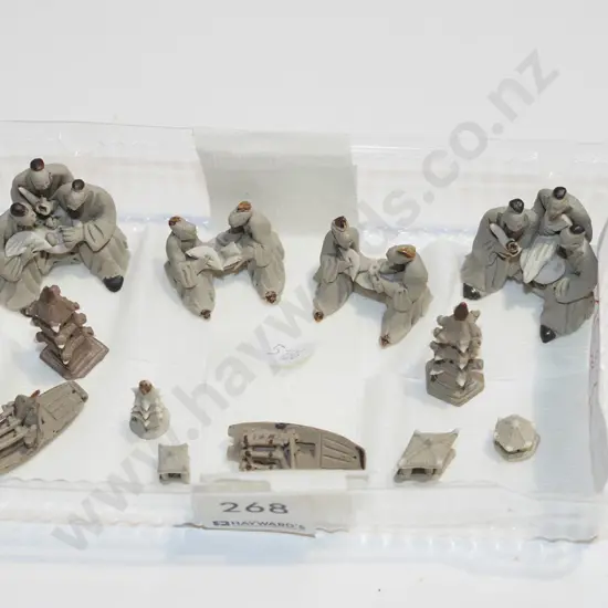 tray of tiny bonsai figurines