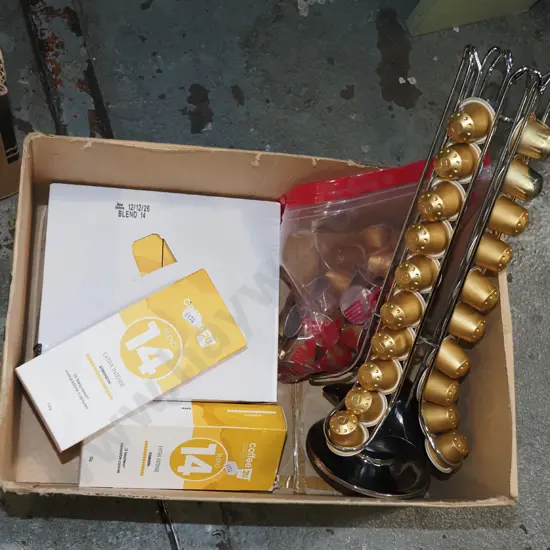 box of coffee pods and dispenser