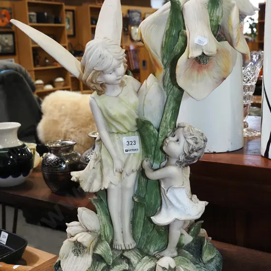 composite ornament - 1 fairy has missing wings H440