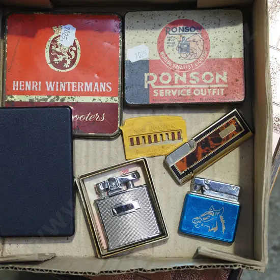 box; cigarette tins and lighters