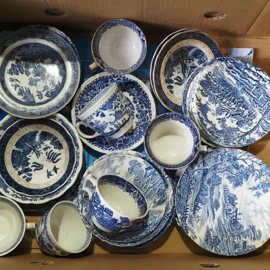 box; blue and white cups, saucers, bowls 
